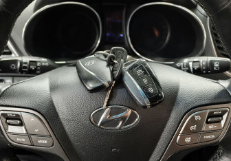 Подержанный автомобиль Hyundai Santa Fe 2013 года (17 фото)