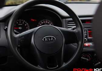 Подержанный автомобиль Kia Rio Hatchback 2010 года (12 фото)