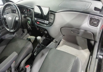 Подержанный автомобиль Kia Rio Sedan 2007 года (10 фото)