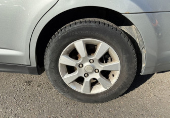 Подержанный автомобиль Nissan Tiida Sedan 2010 года (12 фото)