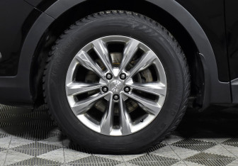 Подержанный автомобиль Hyundai Santa Fe 2015 года (9 фото)