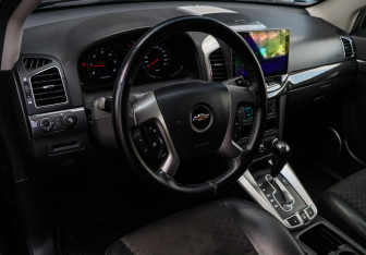 Подержанный автомобиль Chevrolet Captiva 2013 года (13 фото)