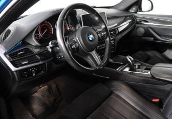 Подержанный автомобиль BMW X6 2018 года (12 фото)