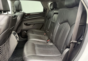 Подержанный автомобиль Cadillac SRX 2010 года (11 фото)