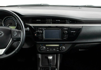 Подержанный автомобиль Toyota Corolla Sedan 2014 года (8 фото)