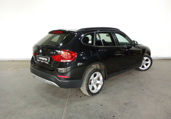 Подержанный автомобиль BMW X1 2013 года (4 фото)