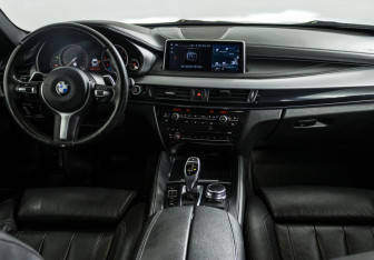 Подержанный автомобиль BMW X6 2017 года (13 фото)