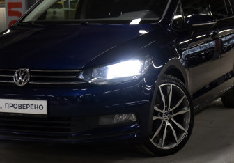 Подержанный автомобиль Volkswagen Touran 2019 года (24 фото)