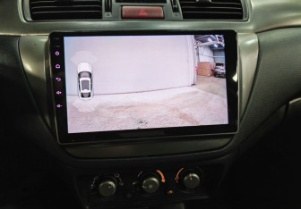 Подержанный автомобиль Mitsubishi Lancer Sedan 2006 года (13 фото)