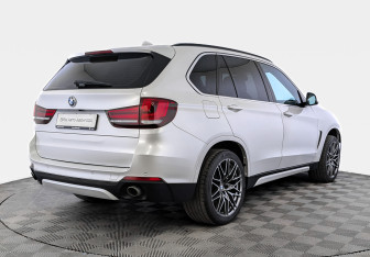 Подержанный автомобиль BMW X5 2014 года (5 фото)