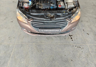 Подержанный автомобиль Peugeot 301 2014 года (14 фото)