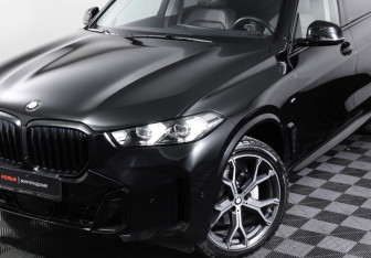 Подержанный автомобиль BMW X5 2024 года (27 фото)