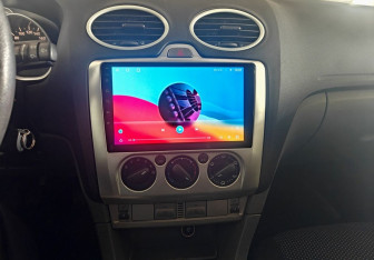 Подержанный автомобиль Ford Focus Hatchback 2010 года (13 фото)