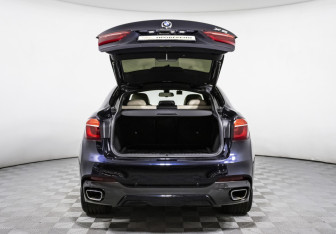 Подержанный автомобиль BMW X6 2015 года (23 фото)