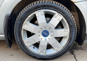 Подержанный автомобиль Ford Mondeo Sedan 2005 года (13 фото)