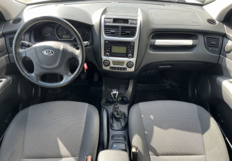 Подержанный автомобиль Kia Sportage 2010 года (10 фото)