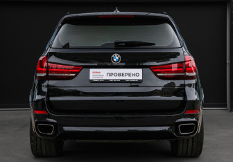 Подержанный автомобиль BMW X5 2015 года (5 фото)