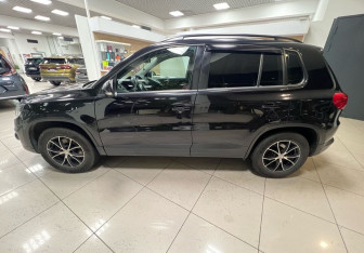 Подержанный автомобиль Volkswagen Tiguan 2014 года (8 фото)