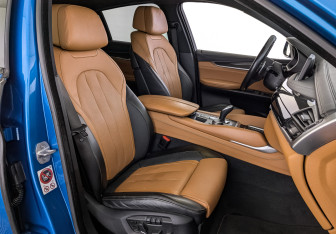 Подержанный автомобиль BMW X6 2018 года (24 фото)