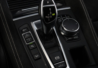 Подержанный автомобиль BMW X6 2016 года (15 фото)