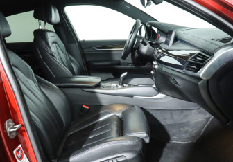 Подержанный автомобиль BMW X6 2014 года (9 фото)