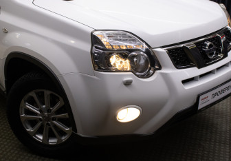 Подержанный автомобиль Nissan X-Trail 2014 года (23 фото)