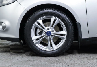 Подержанный автомобиль Ford Focus Sedan 2014 года (8 фото)