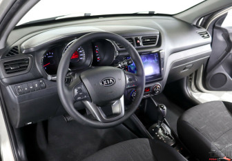 Подержанный автомобиль Kia Rio Sedan 2012 года (10 фото)