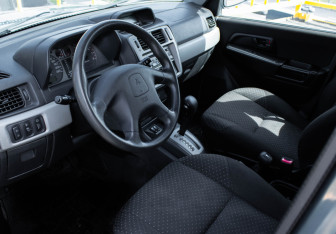Подержанный автомобиль Mitsubishi Pajero Pinin 2004 года (14 фото)