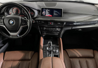 Подержанный автомобиль BMW X6 2016 года (11 фото)