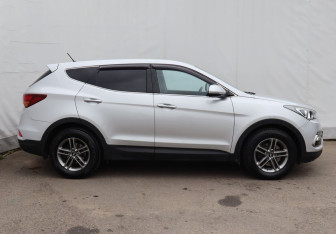 Подержанный автомобиль Hyundai Santa Fe 2015 года (7 фото)
