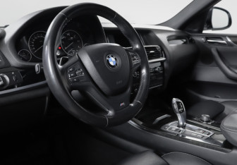 Подержанный автомобиль BMW X4 2015 года (14 фото)