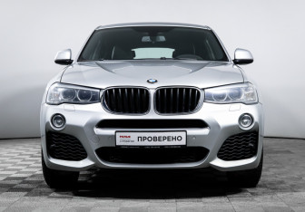 Подержанный автомобиль BMW X4 2015 года (2 фото)