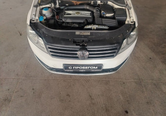 Подержанный автомобиль Volkswagen Passat Sedan 2011 года (9 фото)