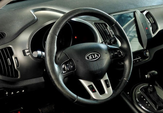 Подержанный автомобиль Kia Sportage 2012 года (13 фото)