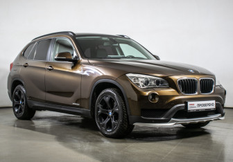 Подержанный автомобиль BMW X1 2014 года (3 фото)