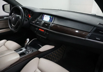 Подержанный автомобиль BMW X6 2012 года (11 фото)