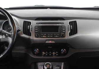 Подержанный автомобиль Kia Sportage 2015 года (11 фото)