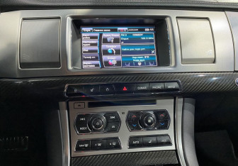 Подержанный автомобиль Jaguar XF Sedan 2014 года (13 фото)