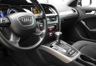 Подержанный автомобиль Audi A4 Sedan 2014 года (7 фото)