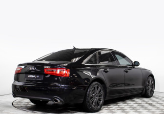 Подержанный автомобиль Audi A6 Sedan 2014 года (5 фото)