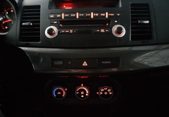 Подержанный автомобиль Mitsubishi Lancer Hatchback 2008 года (13 фото)