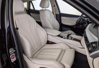 Подержанный автомобиль BMW X6 2015 года (24 фото)