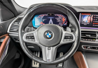 Подержанный автомобиль BMW X6 2022 года (23 фото)