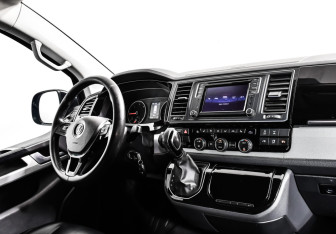 Подержанный автомобиль Volkswagen Multivan 2016 года (9 фото)