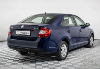 Подержанный автомобиль Skoda Rapid Liftback 2015 года (5 фото)
