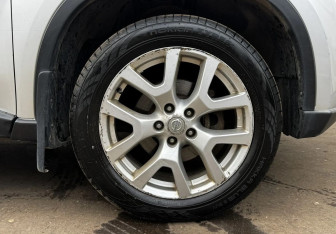 Подержанный автомобиль Nissan X-Trail 2013 года (14 фото)