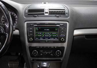 Подержанный автомобиль Skoda Octavia Liftback 2013 года (15 фото)