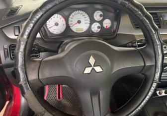 Подержанный автомобиль Mitsubishi Lancer Sedan 2007 года (17 фото)