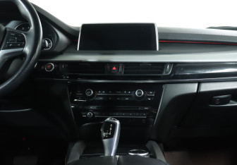 Подержанный автомобиль BMW X5 2014 года (14 фото)